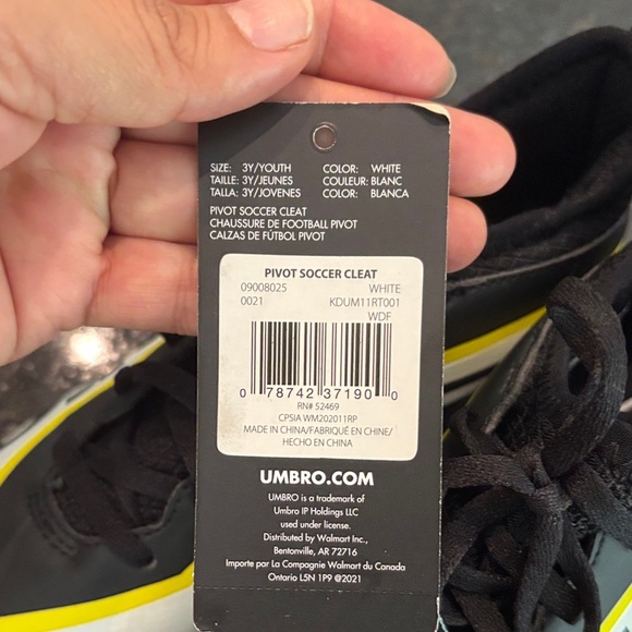 Umbro Black, Yellow, and White Soccer Cleats - Picture 2 of 8